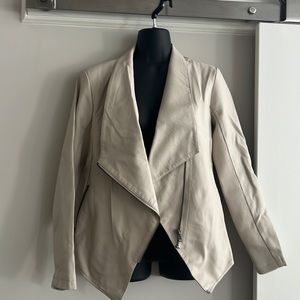 Faux leather jacket. Barely worn but a few small stains in lining